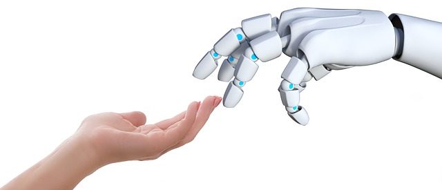 human and robot hands touching fingers depicting a revolution in artificial intelligence